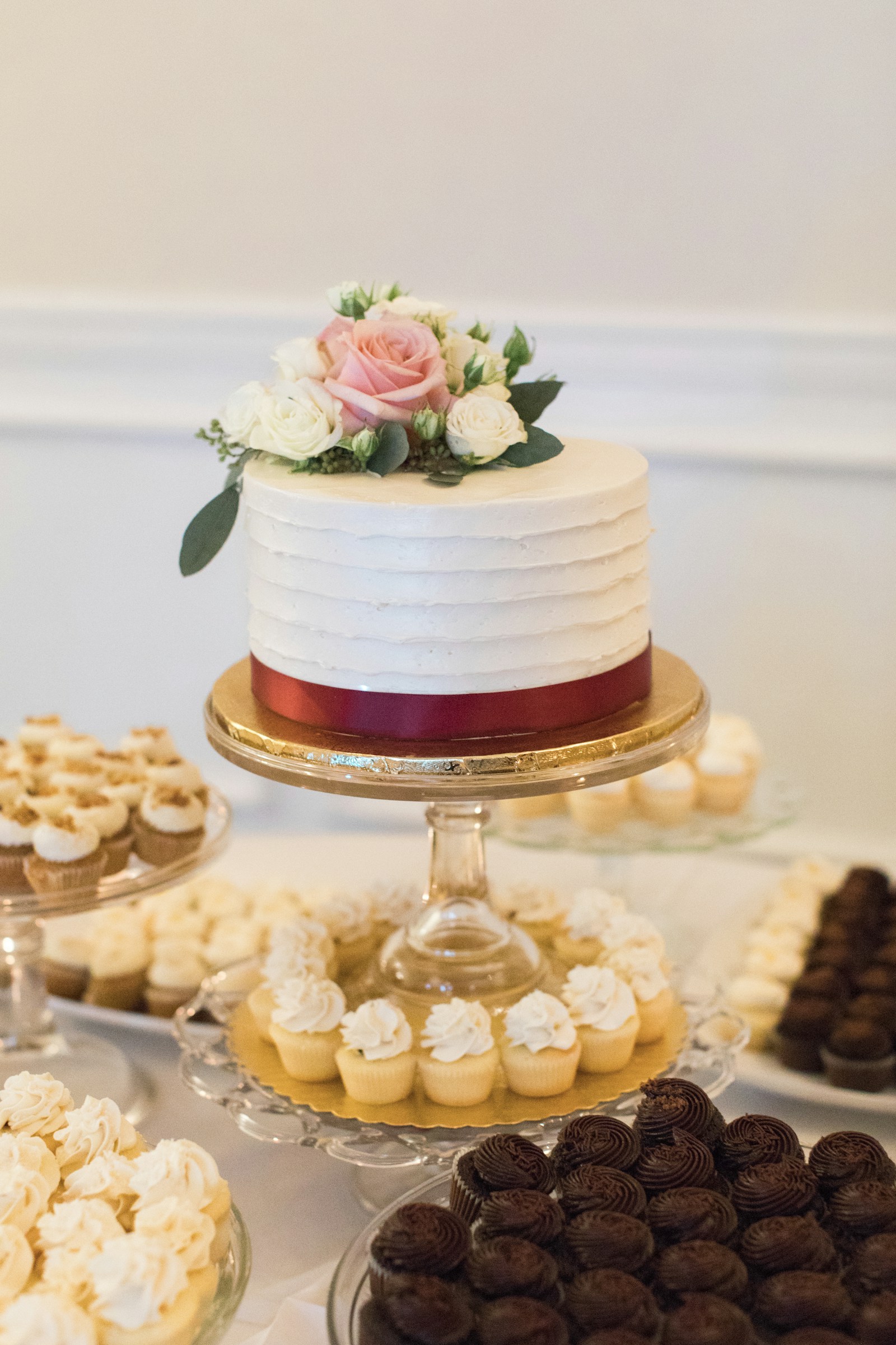 round white cake on cake stand